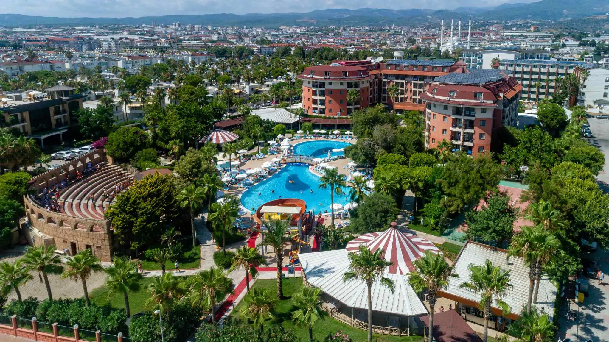 Изглед от въздуха към сградите, басейните и палмовата градина – White City Palmera Beach (ex. Palmeras Beach), Алания