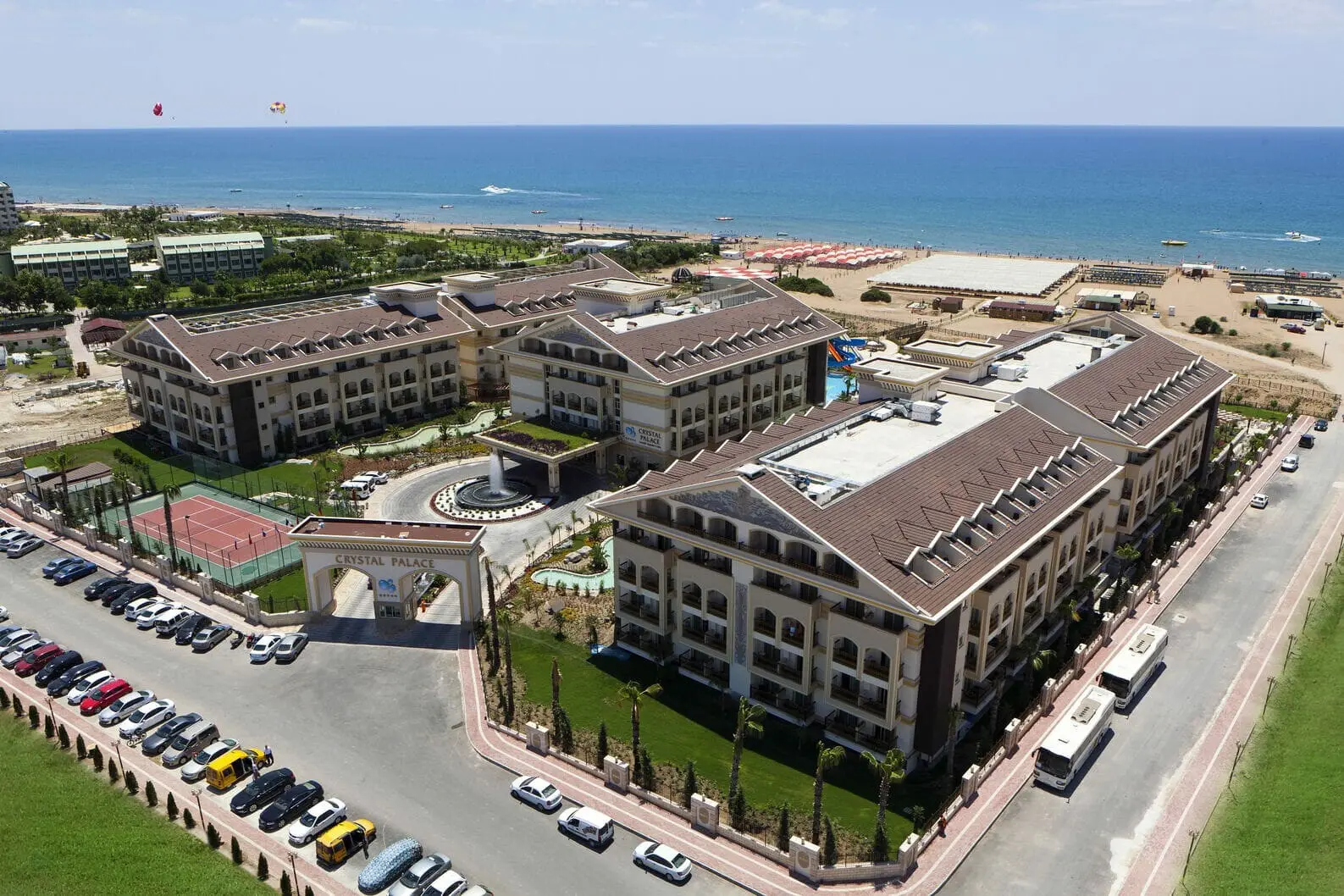 Въздушен изглед към сградите, паркинга и плажа край морето – Diamond Excellence Resort (ex. Crystal Palace), Сиде