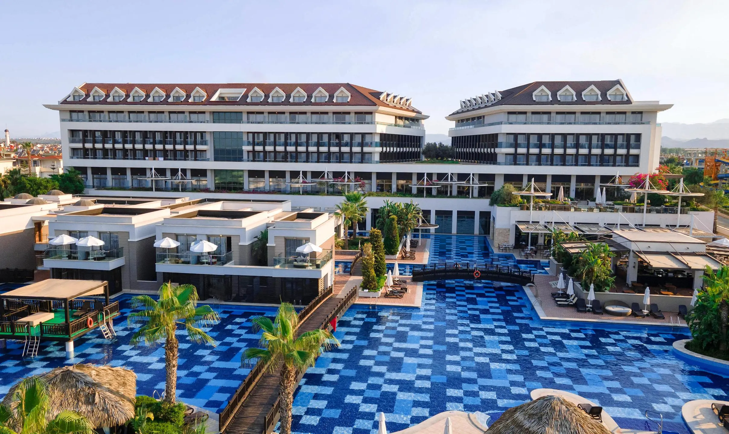 Басейни с мостчета пред двете сгради на хотела, поглед отгоре – TUI Blue Sherwood Belek (16+), Белек