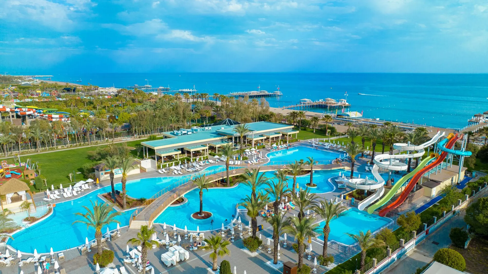 Басейни с палми и водни пързалки до плажа от въздуха – Liberty Hotels Lara, Лара