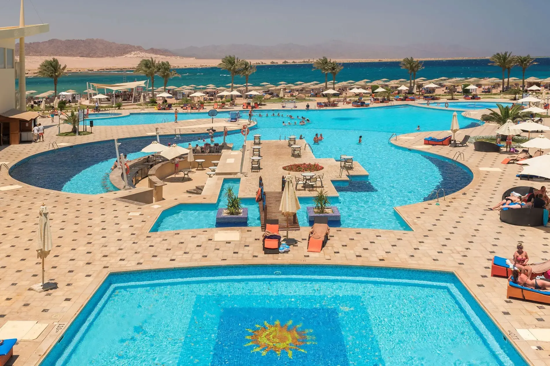 Изглед отвисоко към басейните с мозайка, шезлонгите и морето – Barcelo Tiran Sharm, Шарм Ел Шейх