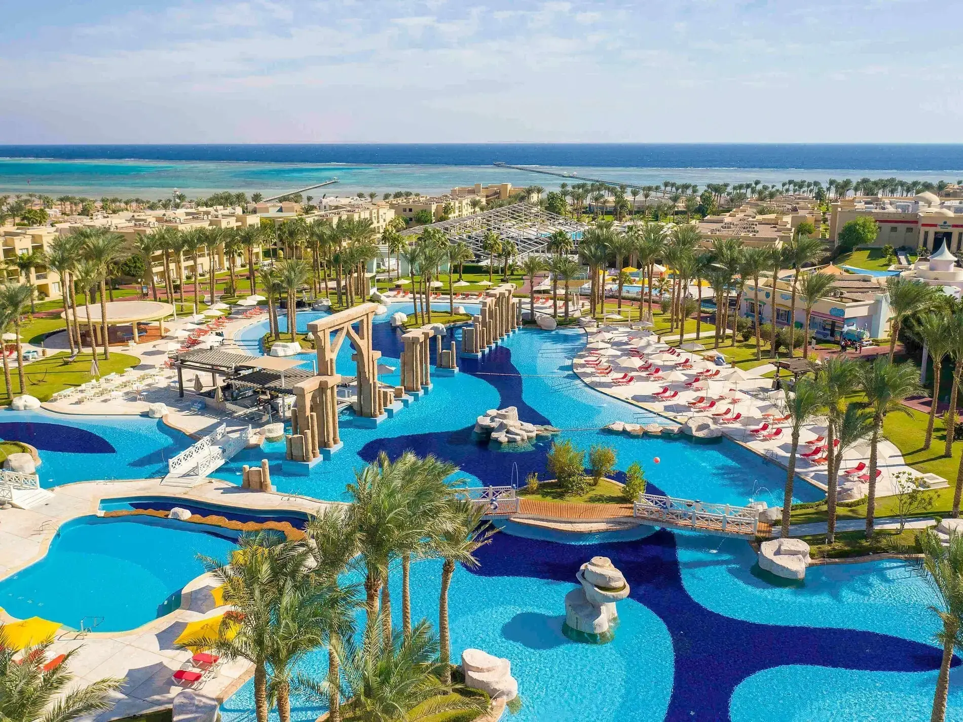 Лагунни басейни сред палми и морето в залива Набк от въздуха – Rixos Premium Seagate, Шарм Ел Шейх