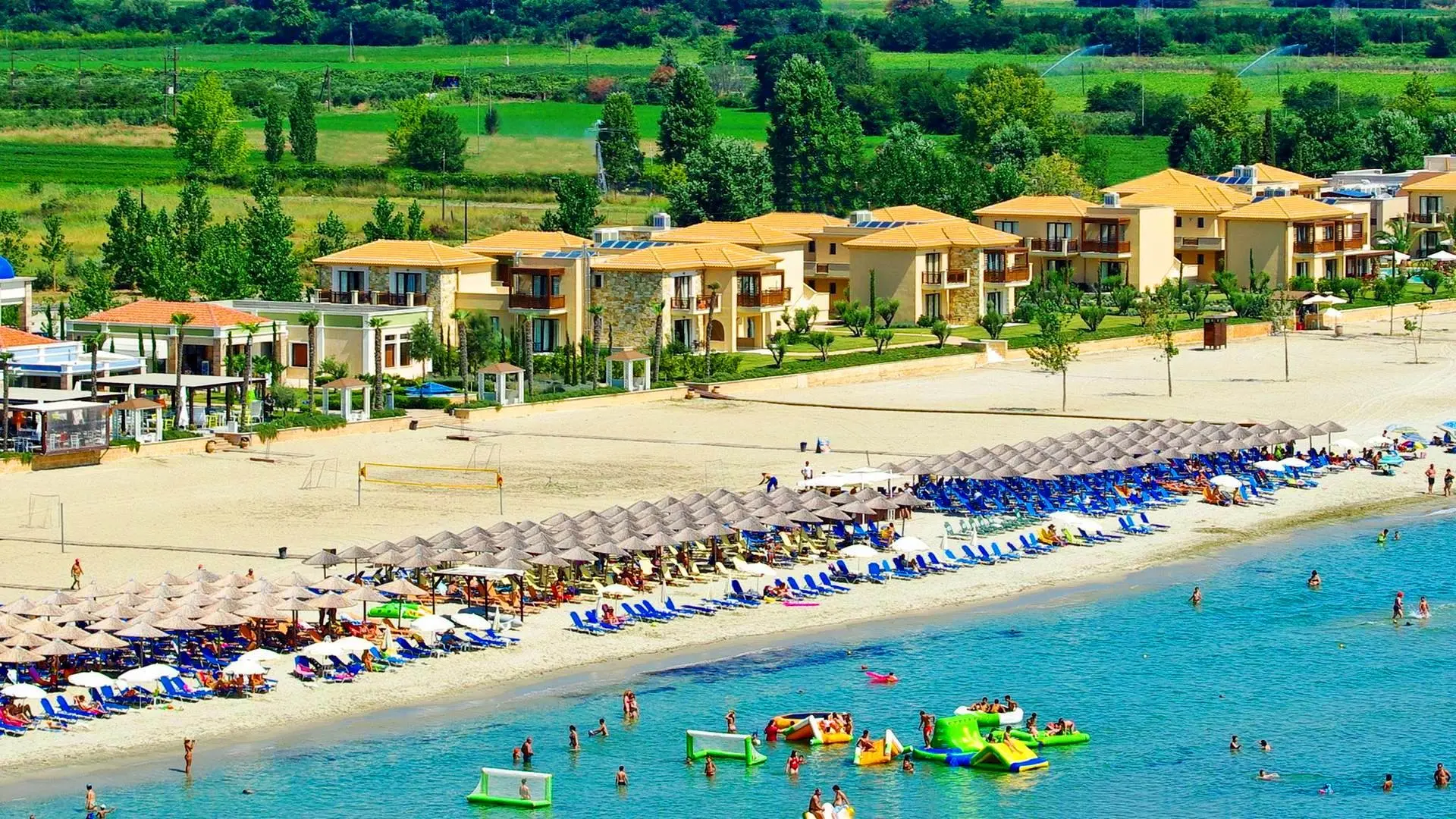 Пясъчният плаж и сградите на хотела от въздуха – Mediterranean Village Hotel & Spa, Олимпийска ривиера